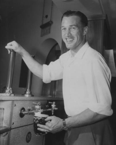 Nat Lofthouse pulling a pint July 1957